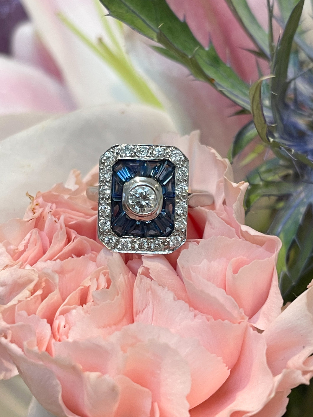 A Sapphire and Brilliant Cut Diamond Dress Ring